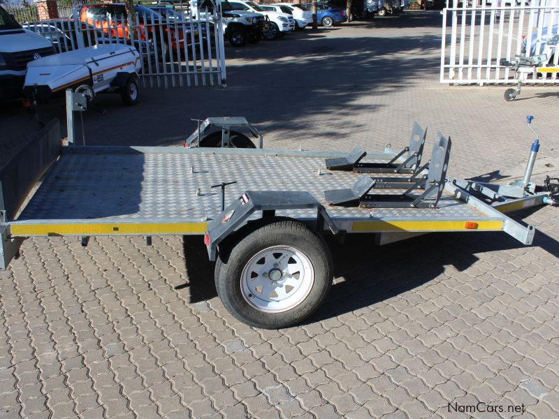 Yellow Equipment Elavating Flat deck in Namibia